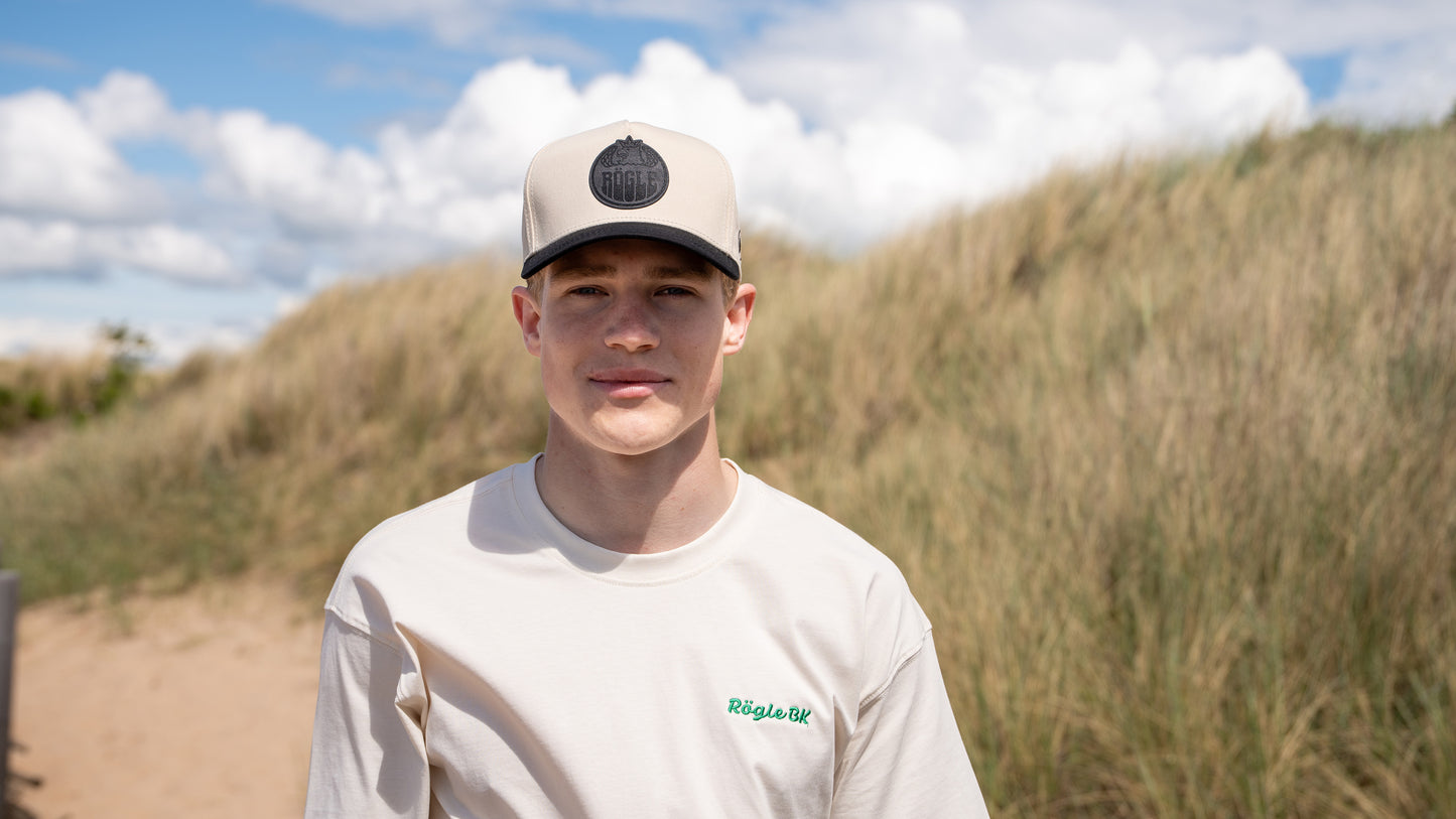Beige keps med patch